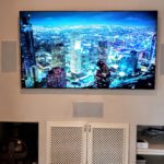 4K tv with in wall speakers and hidden equipment